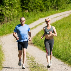 Mature couple doing sport - jogging